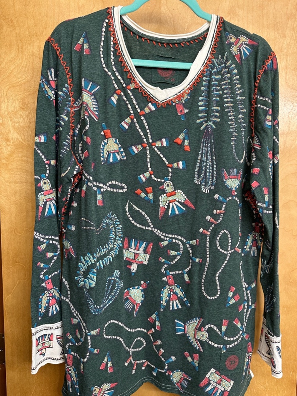 Double D Ranch Dark Green Long Sleeve Tee with Colorful Tribal Motif